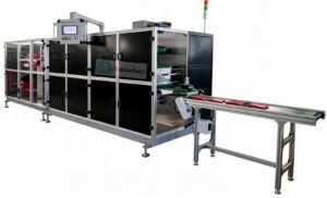 Automatic disposable plastic and nonwoven apron folding machine