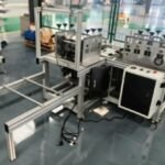 Complete nonwoven shoe cover manufacturing and packing equipment in factory