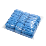 Packed disposable nonwoven shoe covers produced by automatic machine