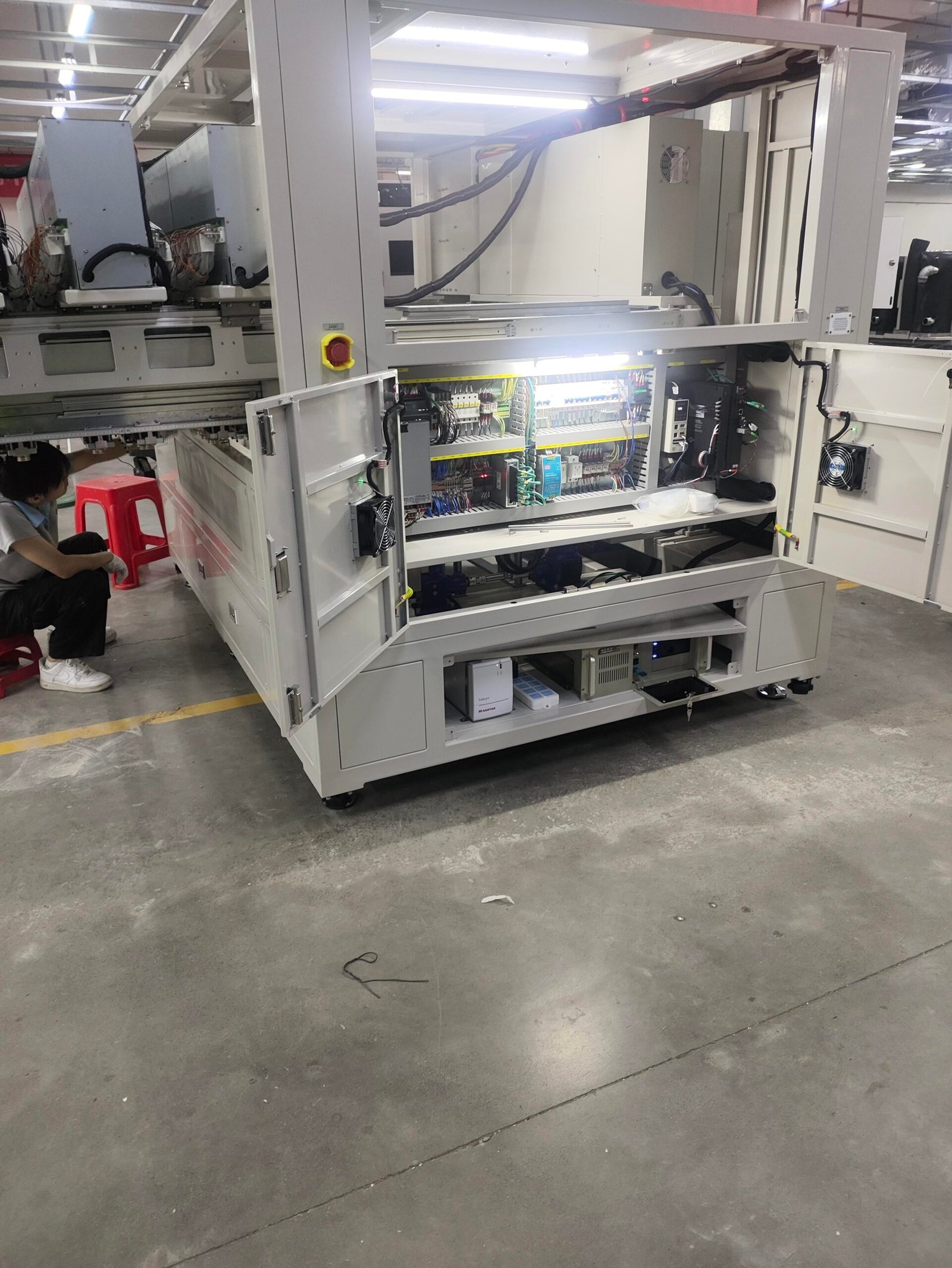 Industrial automation equipment workshop with completed production machinery.